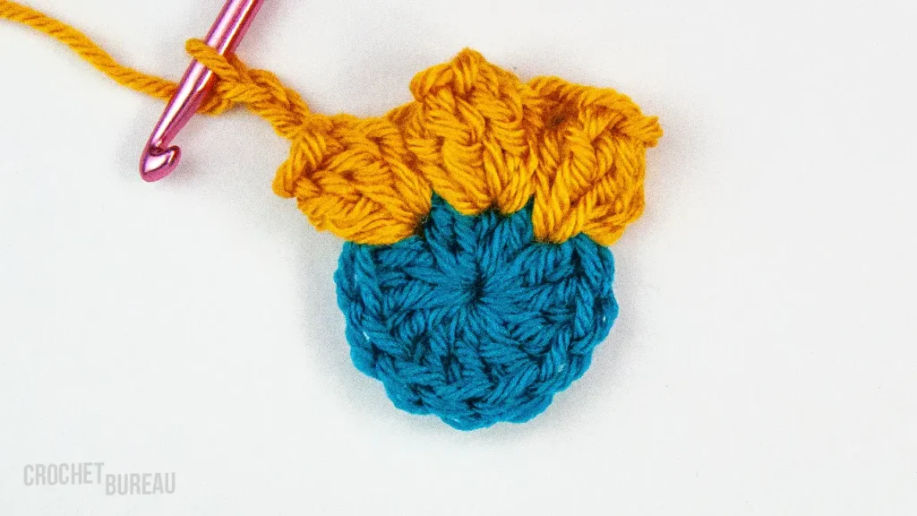 3ch, 3dc in the same loop for a Granny Square for beginners